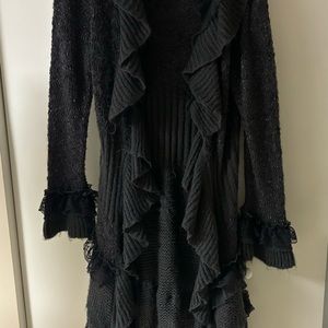 Worn once charcoal gray sweater with ruffled lace